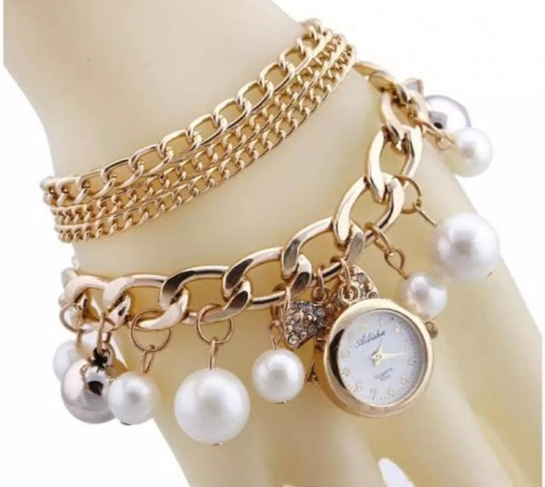Golden pearls crystal bracelet watch for woman.
