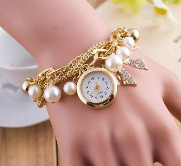 Golden pearls crystal bracelet watch for woman.
