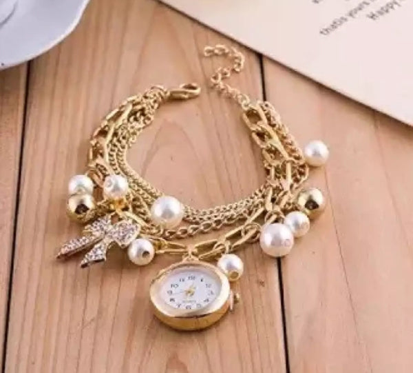 Golden pearls crystal bracelet watch for woman.