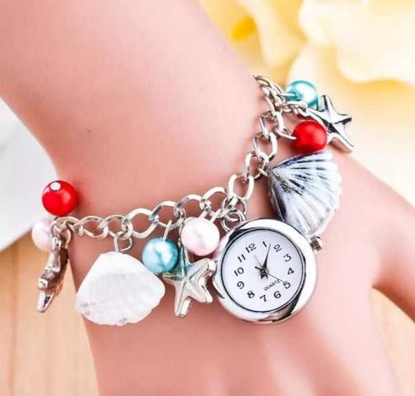 Luxury silver multi chain bracelet watch.