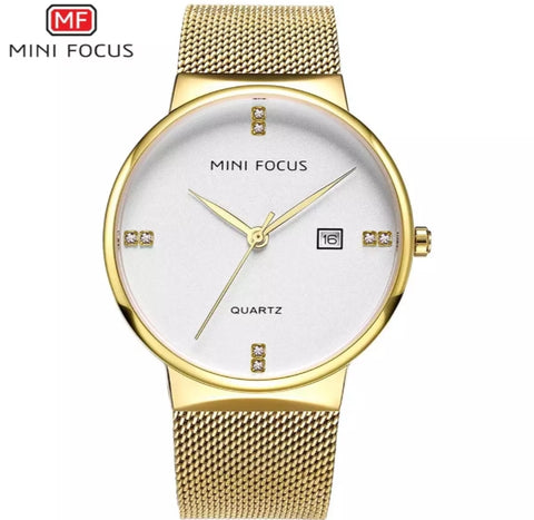 Mini focus Gold dial gold mesh bracelet analog woman watch.