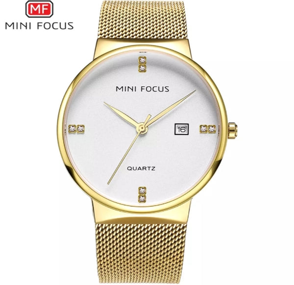 Mini focus Gold dial gold mesh bracelet analog woman watch.